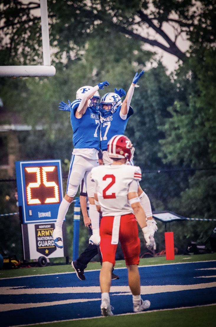 Jackson Arnold (12) and Ian Garrahan (11) touchdown celebration.